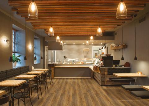 This eco conscious restaurant features smart lighting features and hydrocork flooring.
