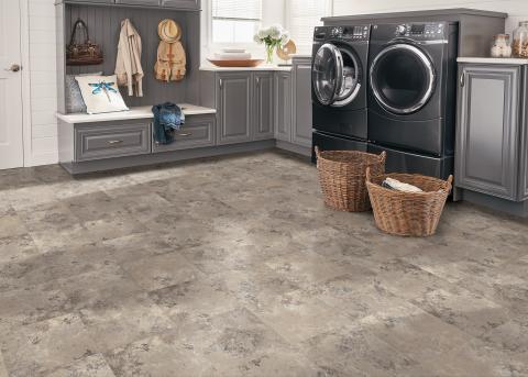 gray waterproof vinyl flooring in a laundry room